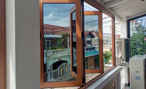A wood frame glass window