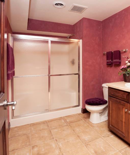Beautiful comfort room with maroon walls, Privacy shower door